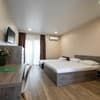 Отель Weekend Family Hotel. Делюкс 4-местный с видом на море 1